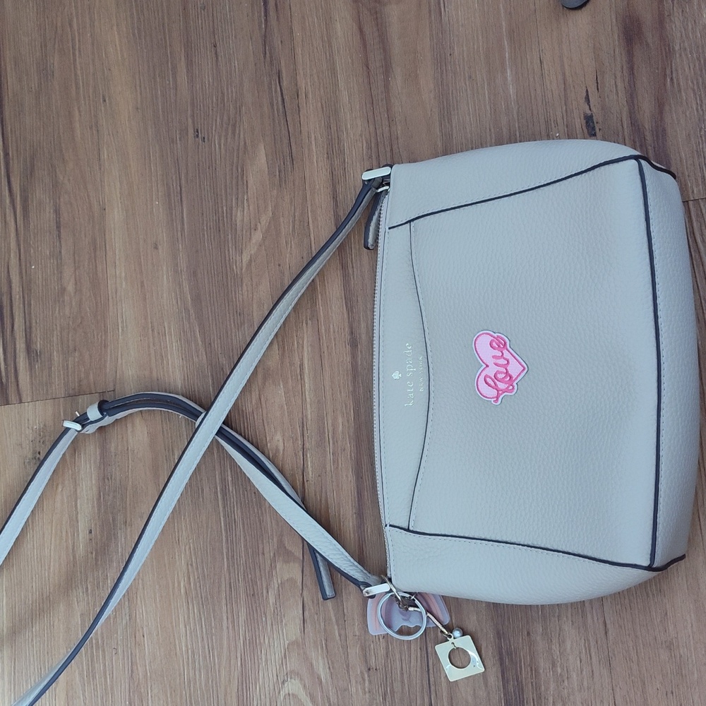 kate spade New York Cream Crossbody Bag with Pink Heart Patch